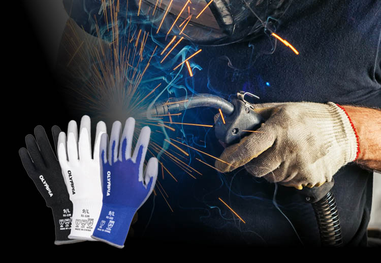 A welder wearing heat-resistant safety gloves applies a blow torch in an industrial setting